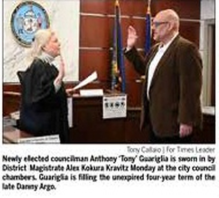 Newspaper photograph of Tony Guariglia being sworn in as Pittston City Councilman
