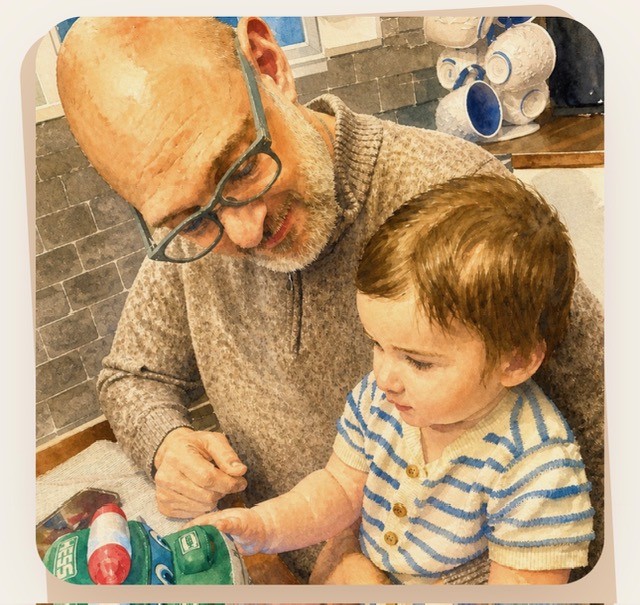 Tony Guariglia with a young child