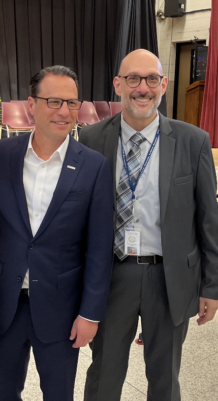 Tony Guariglia with a government leader